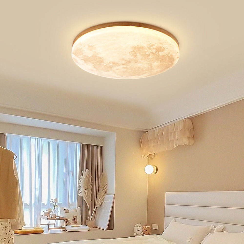 LED ceiling lamp featuring a moonlight effect, designed with a modern minimalist aesthetic in solid wood and acrylic materials. 0